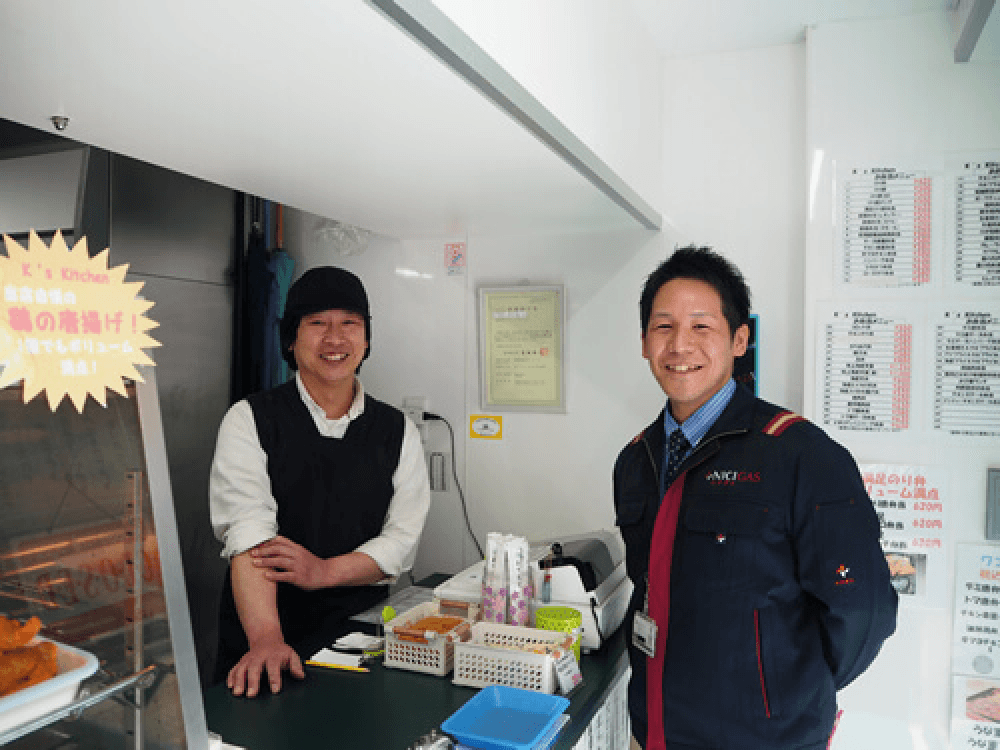 担当者とお客さまの写真 2