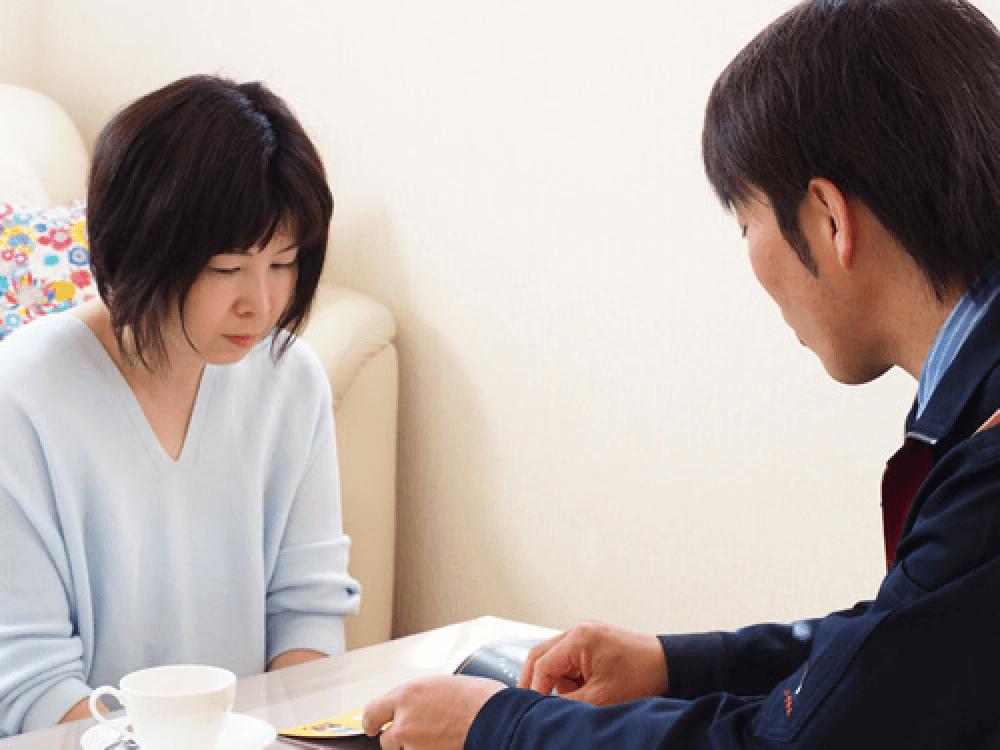 担当者とお客さまの写真 2